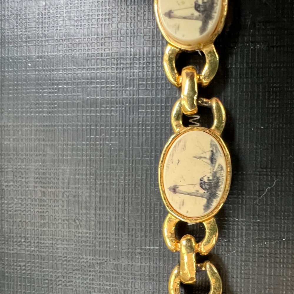 Gold Bracelet with Artistic Charms